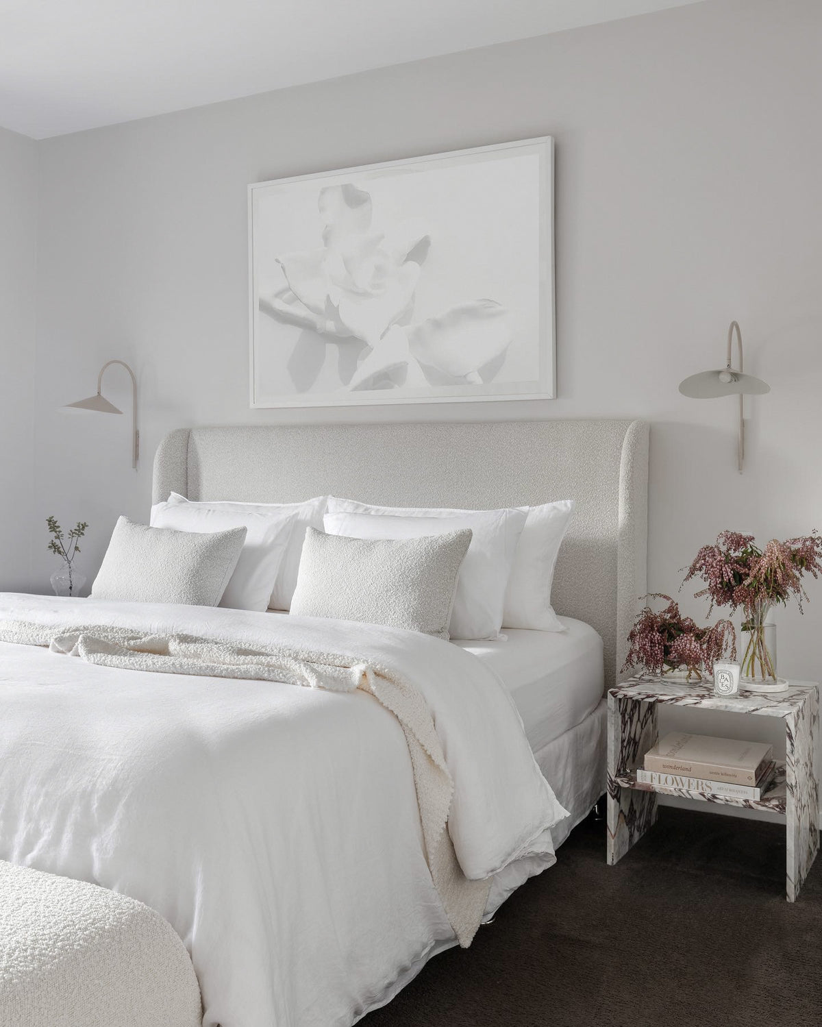 Go With The Flow by DANIELLEX, white floral artwork above a bed